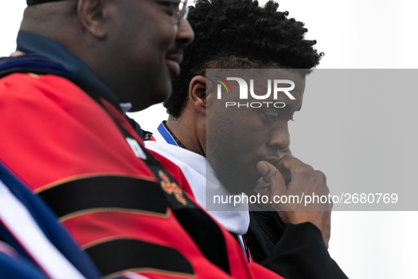 Actor and alumnus Chadwick Boseman (R), after he delivered the keynote address at Howard University's commencement ceremony for the 2018 gra...