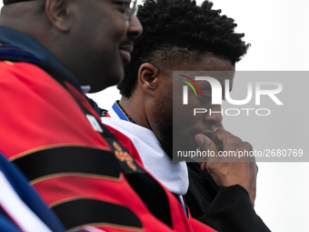 Actor and alumnus Chadwick Boseman (R), after he delivered the keynote address at Howard University's commencement ceremony for the 2018 gra...