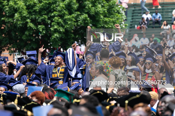 School of Communication graduates celebrate during the commencement ceremony for the 2018 graduating class with actor and alumnus Chadwick B...