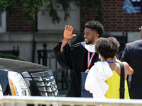 Actor and alumnus Chadwick Boseman (L), waves as he leaves Howard University's commencement ceremony for the 2018 graduating class. Boseman...