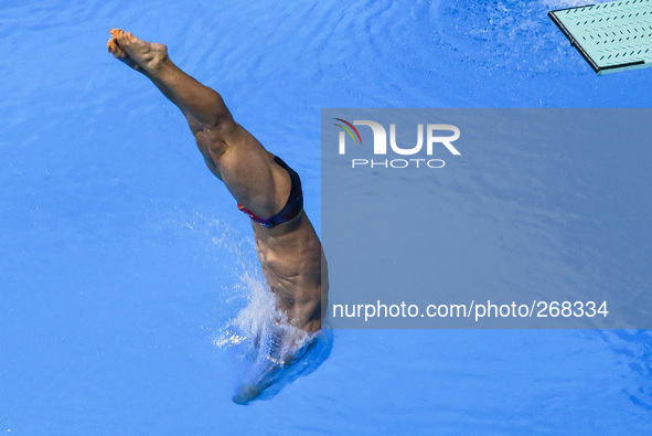 (141001) -- INCHEON, Oct. 1, 2014 () -- He Chao of China competes during the men's 1m springboard final of diving at the 17th Asian Games in...