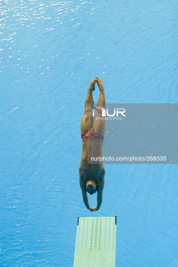 (141001) -- INCHEON, Oct. 1, 2014 () -- He Chong of China competes during the men's 1m springboard final of diving at the 17th Asian Games i...