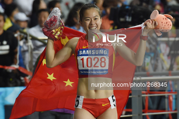 (141001) -- INCHEON, Oct. 1, 2014 () -- Wu Shuijiao of China celebrates after the women's 100m hurdles final of athletics at the 17th Asian...