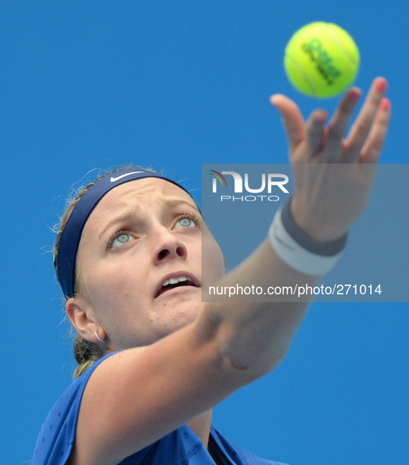 (141003) -- BEIJING, Oct. 3, 2014 () -- Petra Kvitova of Czech Republic serves the ball during the women's quarterfinal match against Robert...