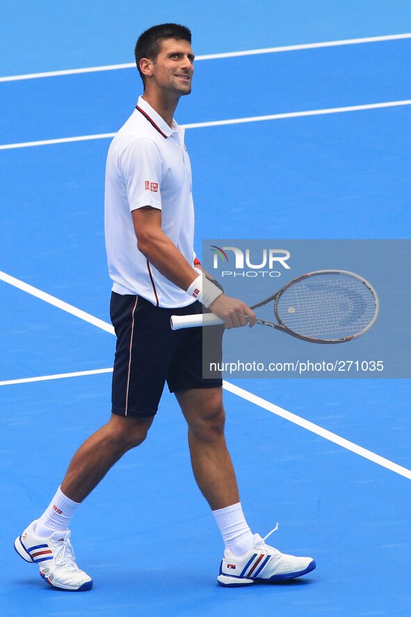 (141003) -- BEIJING, Oct. 3, 2014 () -- Novak Djokovic of Serbia reacts after winning the men's quarterfinal match against Grigor Dimitrov o...