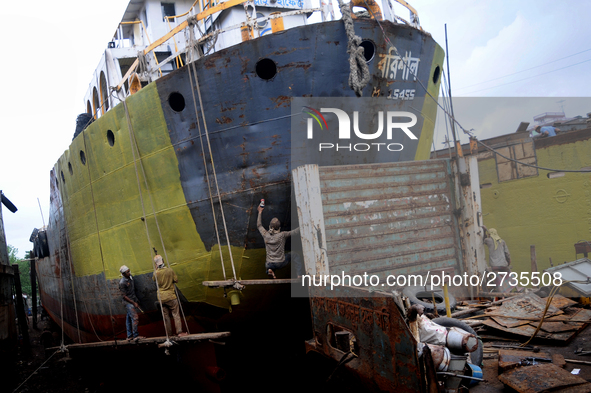 Workers during work at keranigonj Dockyard area in The capital Dhaka, Bangladesh on Wednesday 23 May 2018. 