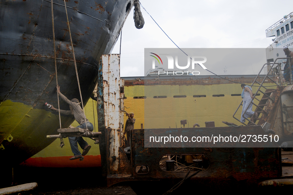 Workers during work at keranigonj Dockyard area in The capital Dhaka, Bangladesh on Wednesday 23 May 2018. 