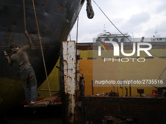 Workers during work at keranigonj Dockyard area in The capital Dhaka, Bangladesh on Wednesday 23 May 2018. (