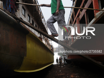 Workers during work at keranigonj Dockyard area in The capital Dhaka, Bangladesh on Wednesday 23 May 2018. (