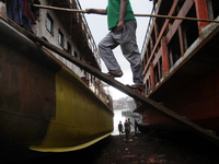 Workers during work at keranigonj Dockyard area in The capital Dhaka, Bangladesh on Wednesday 23 May 2018. (