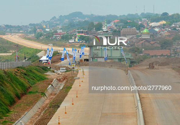 Jami Baitul Mustaghfirin Mosque, standing in the middle of the construction of Batang-Semarang Toll Road, Central Java. Indonesia in June, 4...