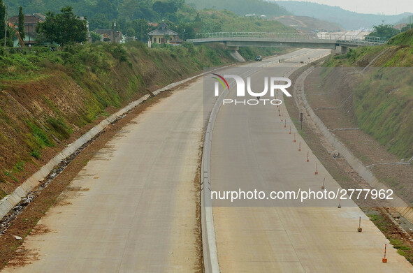 Jami Baitul Mustaghfirin Mosque, standing in the middle of the construction of Batang-Semarang Toll Road, Central Java. Indonesia in June, 4...