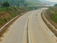 Jami Baitul Mustaghfirin Mosque, standing in the middle of the construction of Batang-Semarang Toll Road, Central Java. Indonesia in June, 4...