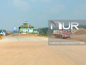 Jami Baitul Mustaghfirin Mosque, standing in the middle of the construction of Batang-Semarang Toll Road, Central Java. Indonesia in June, 4...