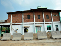 Jami Baitul Mustaghfirin Mosque, standing in the middle of the construction of Batang-Semarang Toll Road, Central Java. Indonesia in June, 4...