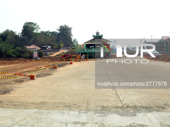 Jami Baitul Mustaghfirin Mosque, standing in the middle of the construction of Batang-Semarang Toll Road, Central Java. Indonesia in June, 4...