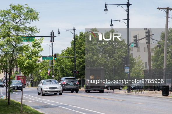 A United Parcel Service of America truck and drop-off box are seen along Milwaukee Avenue in the Old Irving Park neighborhood of Chicago, IL...