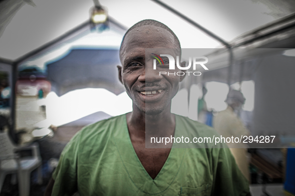 Lassana Gabana, a 35-year-old Ebola survivor turned social worker talks to patients and provides comfort. 
The World Health Organization say...