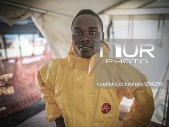 Alphonso, a 20-year-old hygenist had to convince his grandmother to let him work at the ETU. "I said if my fellow Liberians are getting sick...