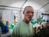 Baeyan Kennedy, a 32-year-old nurse, also works at the ETU. He came from a suburb in Montserrado County to Monrovia to work at MSF. The Worl...