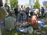 taxis block an avenue amid a strike by cabbies in Madrid on July 31, 2018. - Taxi drivers across Spain kept striking against ride-hailing co...