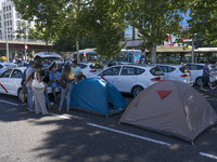 taxis block an avenue amid a strike by cabbies in Madrid on July 31, 2018. - Taxi drivers across Spain kept striking against ride-hailing co...