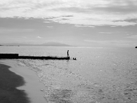 A lone fisherman on Dili beach (