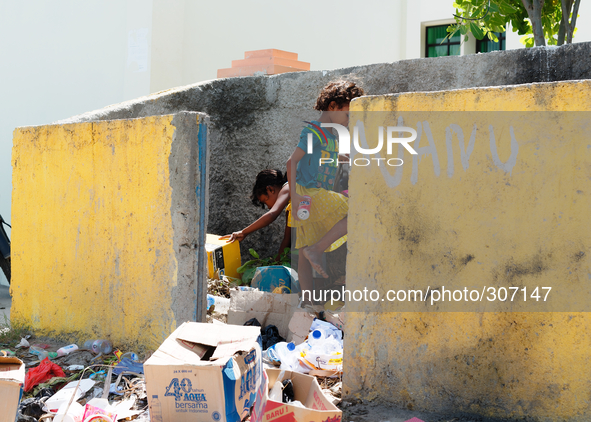 A common sight of children search rubbish in Timor Leste 