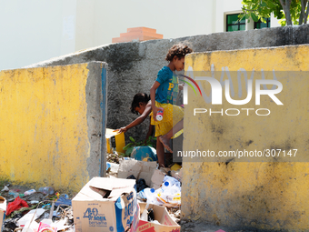 A common sight of children search rubbish in Timor Leste (