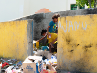 A common sight of children search rubbish in Timor Leste (