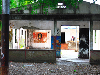 A house in Dili bares the scars of the 24 year Indonesian rule in which more than 300,000 people died. (