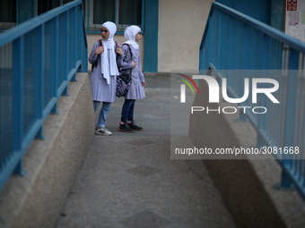 palestinian school girls walk at the Gaza City, on the first day of a new school year, in Gaza City August 29, 2018. 
 (