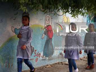 palestinian school girls walk at the Gaza City, on the first day of a new school year, in Gaza City August 29, 2018. 
 (