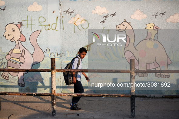 palestinian school walk at the Gaza City, on the first day of a new school year, in Gaza City August 29, 2018. 
 