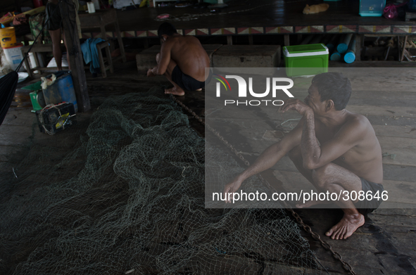 Phumi Moat Khla, Tonle Sap, Cambodia. People living around the lake are extremely poor and depend on the lake for their survival. During rec...