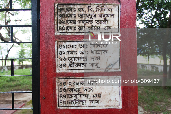 Names written on the wall of the gate of the graveyard. Its a shame for the Bangladeshis that today often there are instances that fight tak...