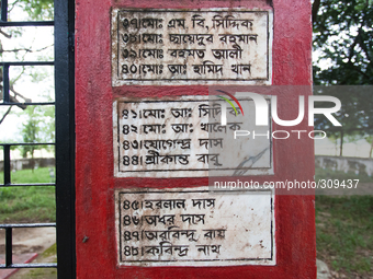 Names written on the wall of the gate of the graveyard. Its a shame for the Bangladeshis that today often there are instances that fight tak...