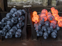 People at work in a forging and mechanical plant in Lozova, Ukraine, on August 31, 2018 (