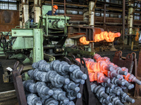 People at work in a forging and mechanical plant in Lozova, Ukraine, on August 31, 2018 (