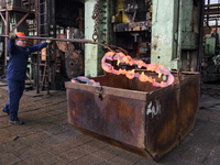 People at work in a forging and mechanical plant in Lozova, Ukraine, on August 31, 2018 (