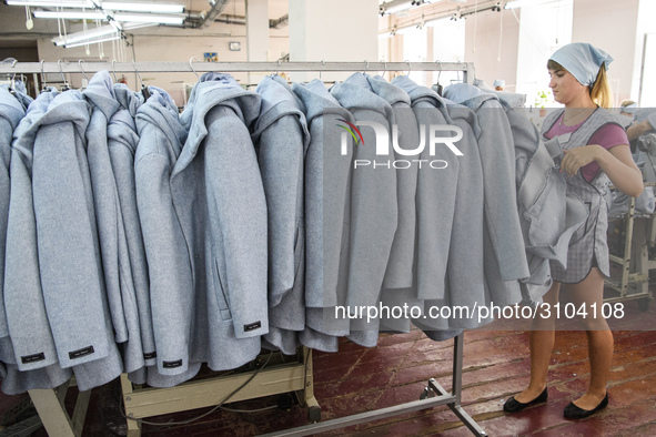 People at work in a factory for fabric tailoring, in Skvyra, Ukraine, on September 3, 2018. 