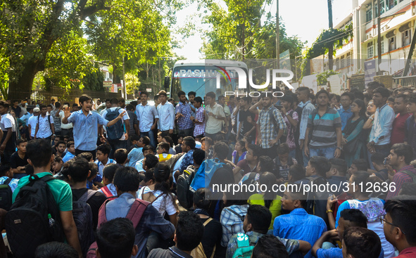 Cotton University and Handique Girls College students stage a protest by blocking road in front of office of the Deputy Commissioner, Kamrup...