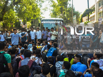 Cotton University and Handique Girls College students stage a protest by blocking road in front of office of the Deputy Commissioner, Kamrup...