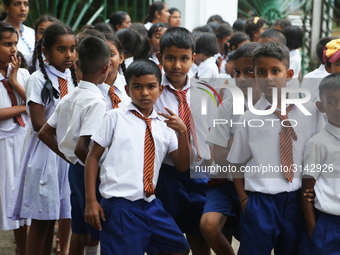 School children attend a field trip to the Royal Botanical Gardens in Peradeniya, Sri Lanka. The Royal Botanical Gardens is located to the w...