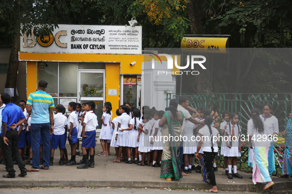 School children attend a field trip to the Royal Botanical Gardens in Peradeniya, Sri Lanka. The Royal Botanical Gardens is located to the w...