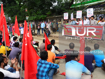 Activists from Bangladeshi garments organization stage demonstration in Dhaka rejecting the government’s decision to raise their minimum mon...