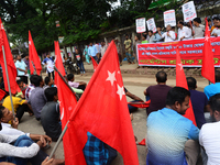 Activists from Bangladeshi garments organization stage demonstration in Dhaka rejecting the government’s decision to raise their minimum mon...