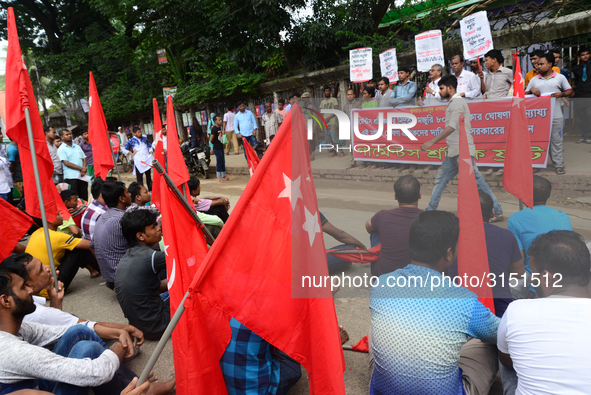 Activists from Bangladeshi garments organization stage demonstration in Dhaka rejecting the government’s decision to raise their minimum mon...