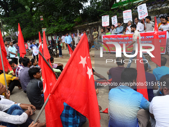 Activists from Bangladeshi garments organization stage demonstration in Dhaka rejecting the government’s decision to raise their minimum mon...