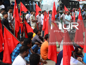 Activists from Bangladeshi garments organization stage demonstration in Dhaka rejecting the government’s decision to raise their minimum mon...